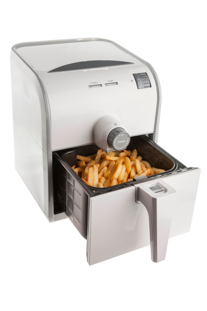 air fryer with fries in basket