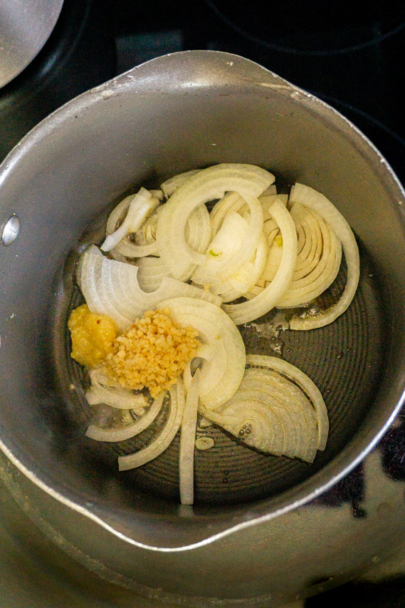 ginger, onions, and garlic in pan 